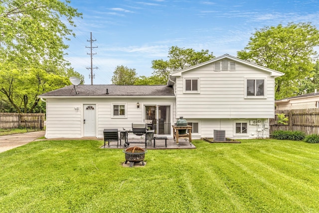 204 Meadowlake Rd, Canton, MI 48188 - rear view of house with a fire pit and a patio area