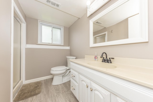 204 Meadowlake Rd, Canton, MI 48188 - bathroom featuring toilet, vanity, a shower with shower door, and baseboards