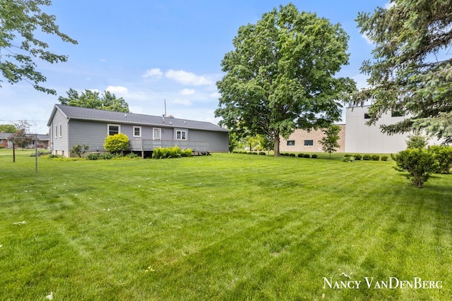 2857 Autumn Ct, Hudsonville, MI 49426 - view of grassy yard with a deck