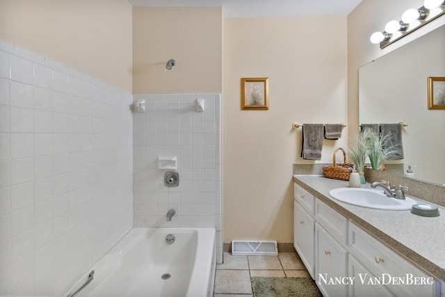 2857 Autumn Ct, Hudsonville, MI 49426 - full bath featuring tile patterned floors, vanity, and shower / washtub combination