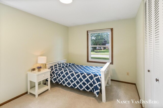 2857 Autumn Ct, Hudsonville, MI 49426 - carpeted bedroom featuring a closet and baseboards