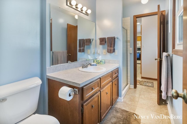 2857 Autumn Ct, Hudsonville, MI 49426 - full bathroom with toilet, vanity, a stall shower, and tile patterned floors