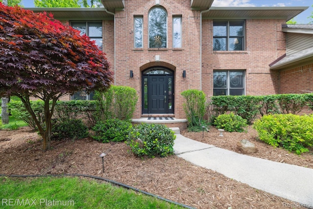 4298 Emu Dr, Pinckney, MI 48169 - entrance to property with brick siding