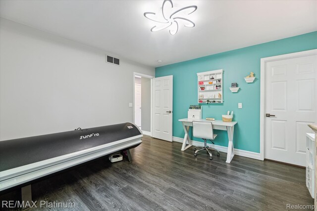4298 Emu Dr, Pinckney, MI 48169 - office area featuring wood finished floors and baseboards