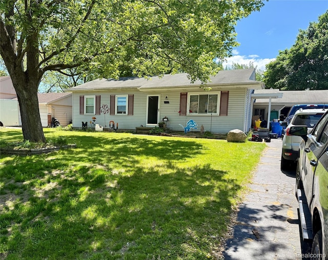 723 Los Arboles Dr, Wolverine Lake, MI 48390 - view of front of house with a front yard
