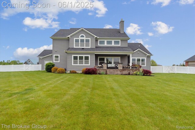 6268 Victoria Ln, Swartz Creek, MI 48473 - rear view of property with a chimney