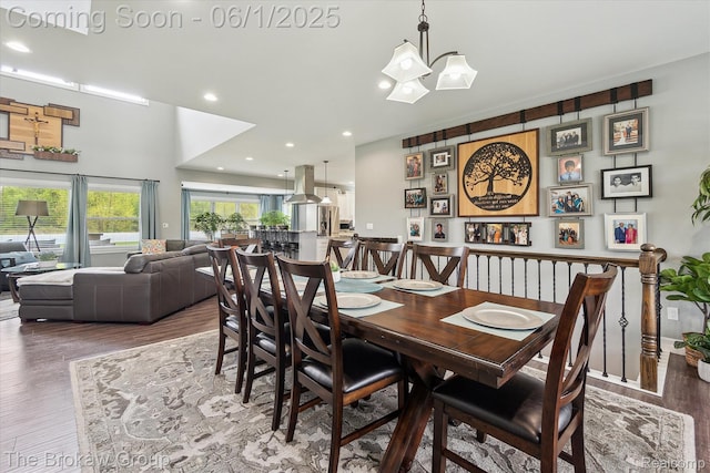 6268 Victoria Ln, Swartz Creek, MI 48473 - dining space with wood finished floors, a chandelier, and recessed lighting