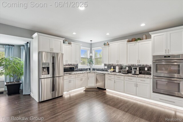 6268 Victoria Ln, Swartz Creek, MI 48473 - kitchen with appliances with stainless steel finishes, white cabinets, backsplash, dark wood-type flooring, and recessed lighting