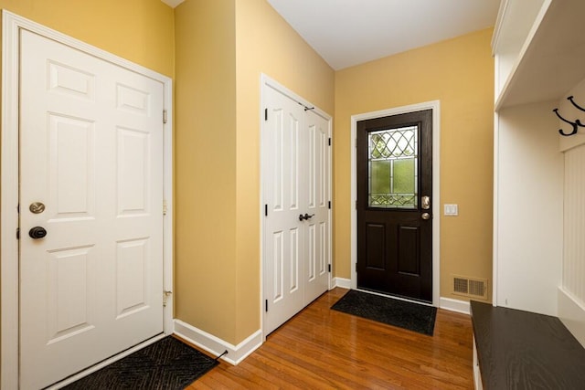 50550 W Fellows Creek Ct, Plymouth, MI 48170 - foyer entrance featuring wood finished floors and baseboards