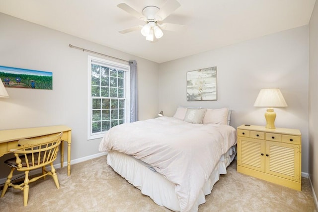50550 W Fellows Creek Ct, Plymouth, MI 48170 - bedroom with light colored carpet, baseboards, and ceiling fan