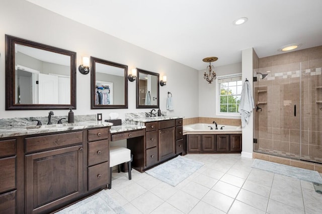 50550 W Fellows Creek Ct, Plymouth, MI 48170 - full bath featuring double vanity, a garden tub, a stall shower, tile patterned flooring, and recessed lighting