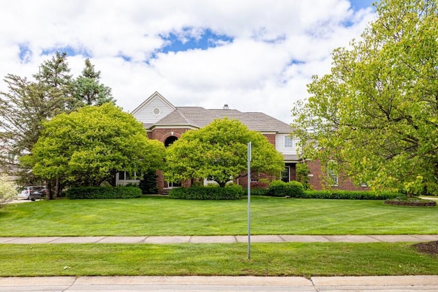 50550 W Fellows Creek Ct, Plymouth, MI 48170 - view of front of property with a front yard and brick siding