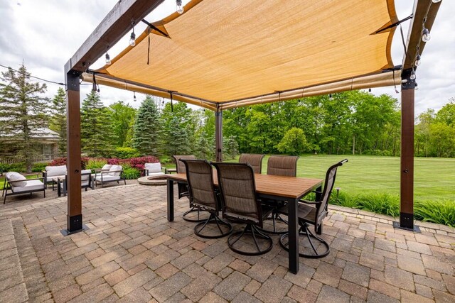 50550 W Fellows Creek Ct, Plymouth, MI 48170 - view of patio / terrace with outdoor dining space, outdoor lounge area, and view of scattered trees