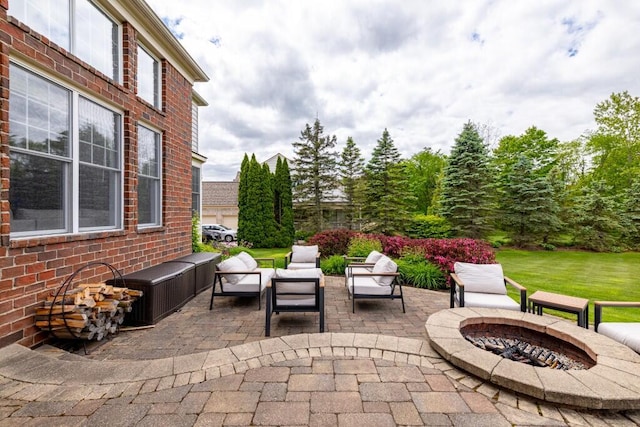 50550 W Fellows Creek Ct, Plymouth, MI 48170 - view of patio / terrace with an outdoor living space with a fire pit