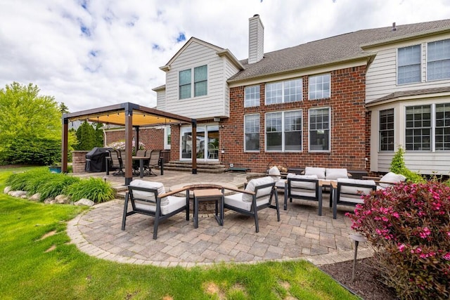 50550 W Fellows Creek Ct, Plymouth, MI 48170 - rear view of house featuring outdoor lounge area, a gazebo, brick siding, a chimney, and a patio area