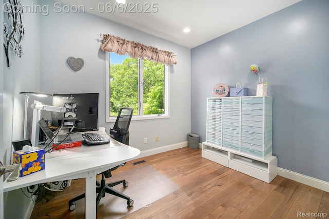 13135 Eagle Ct, South Lyon, MI 48178 - office featuring baseboards and wood finished floors