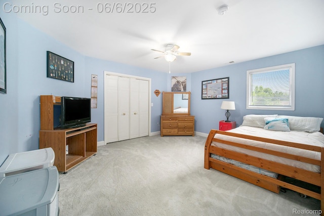 13135 Eagle Ct, South Lyon, MI 48178 - bedroom featuring carpet floors, a closet, baseboards, and ceiling fan