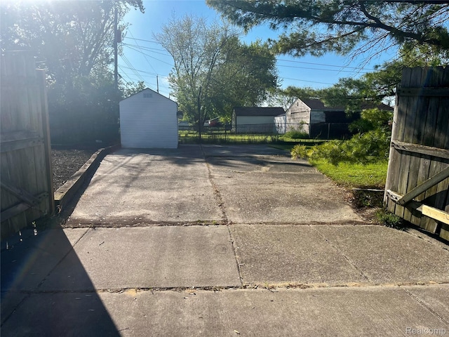 23406 Glenbrook St, Saint Clair Shores, MI 48082 - view of concrete driveway