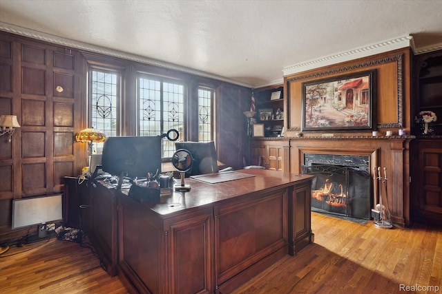925 Avon St, Flint, MI 48503 - office featuring a high end fireplace, wood finished floors, and ornamental molding