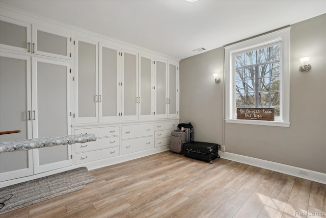 925 Avon St, Flint, MI 48503 - spare room with light wood-type flooring and baseboards