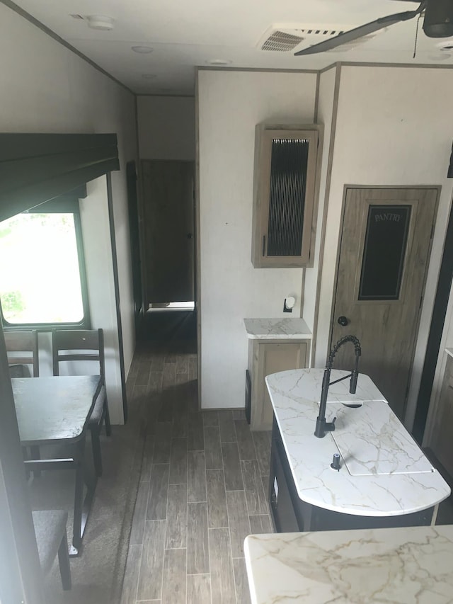 5501 Egner St NE, Cedar Springs, MI 49319 - bathroom with wood finished floors and ceiling fan