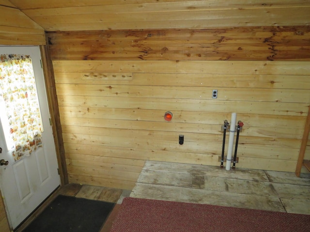 236 S Jeffery Ave, Ithaca, MI 48847 - laundry area featuring wood walls