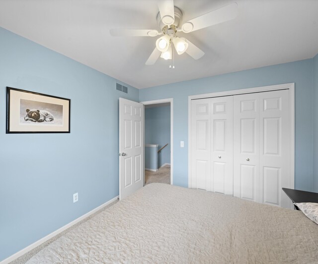 702 Starfield Dr, Pinckney, MI 48169 - carpeted bedroom with a closet, baseboards, and a ceiling fan