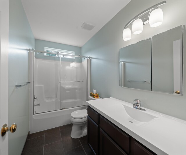 702 Starfield Dr, Pinckney, MI 48169 - bathroom with vanity, toilet, bathtub / shower combination, and tile patterned flooring