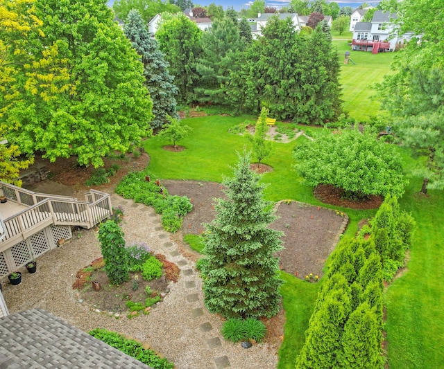 702 Starfield Dr, Pinckney, MI 48169 - view of green lawn featuring a wooden deck
