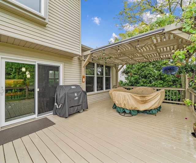 702 Starfield Dr, Pinckney, MI 48169 - deck with a grill and a pergola