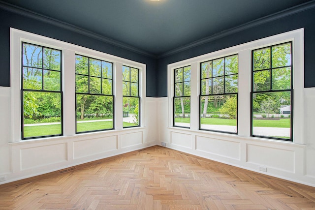 310 Lakeside Dr SE, East Grand Rapids, MI 49506 - spare room featuring a decorative wall, crown molding, and a wainscoted wall
