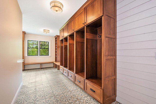310 Lakeside Dr SE, East Grand Rapids, MI 49506 - mudroom featuring wood walls and baseboards