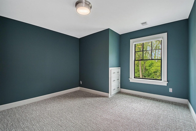 310 Lakeside Dr SE, East Grand Rapids, MI 49506 - carpeted spare room with baseboards