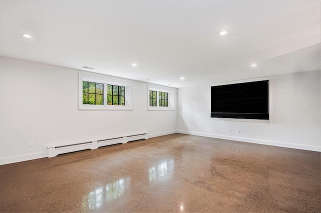 310 Lakeside Dr SE, East Grand Rapids, MI 49506 - spare room featuring a baseboard radiator, recessed lighting, baseboards, and speckle patterned floor