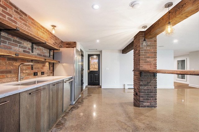 310 Lakeside Dr SE, East Grand Rapids, MI 49506 - bar featuring a sink, a baseboard radiator, dishwasher, baseboards, and hanging light fixtures