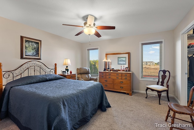 1733 Grevel Ct, Muskegon, MI 49444 - bedroom featuring light carpet, ceiling fan, and baseboards