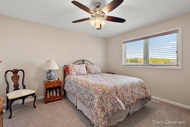 1733 Grevel Ct, Muskegon, MI 49444 - bedroom with light carpet, baseboards, and ceiling fan