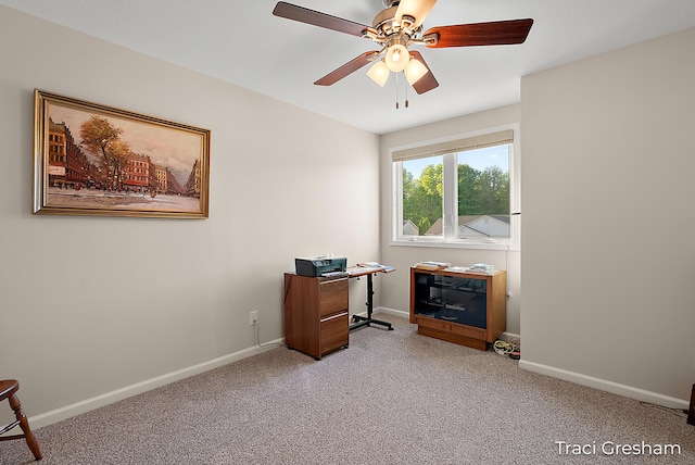 1733 Grevel Ct, Muskegon, MI 49444 - office area featuring ceiling fan, carpet floors, and baseboards
