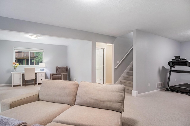 3724 Charlevoix Dr SE, Grand Rapids, MI 49546 - living area featuring carpet flooring, stairs, an office area, and baseboards