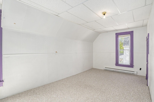 706 N Linn St, Bay City, MI 48706 - bonus room with baseboard heating, carpet, and vaulted ceiling