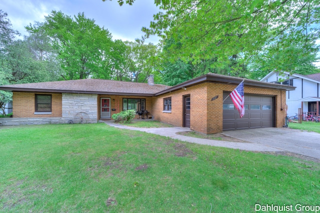 2587 Pennsylvania Ave, Muskegon, MI 49445 - ranch-style house featuring a garage, brick siding, driveway, a front yard, and a chimney