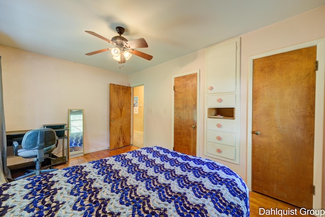 2587 Pennsylvania Ave, Muskegon, MI 49445 - bedroom with wood finished floors and a ceiling fan