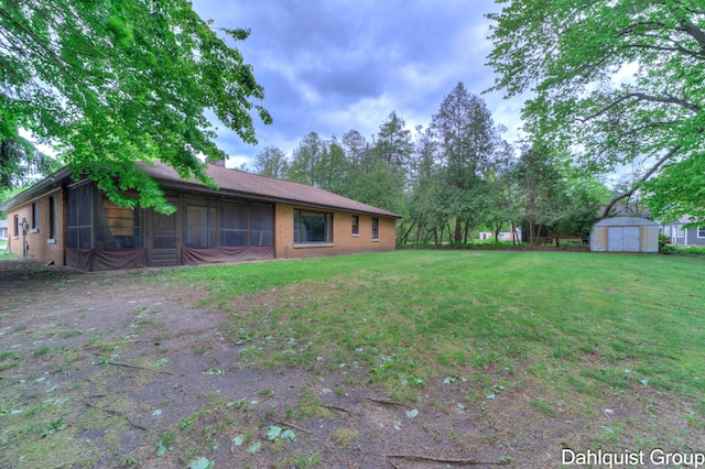 2587 Pennsylvania Ave, Muskegon, MI 49445 - view of green lawn featuring a sunroom
