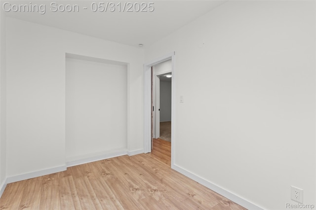 27677 Doreen St, Farmington Hills, MI 48336 - empty room featuring light wood-type flooring and baseboards