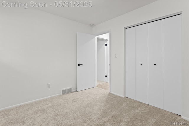 27677 Doreen St, Farmington Hills, MI 48336 - unfurnished bedroom featuring carpet flooring, a closet, and baseboards