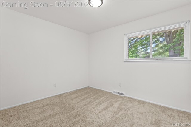 27677 Doreen St, Farmington Hills, MI 48336 - carpeted spare room featuring baseboards