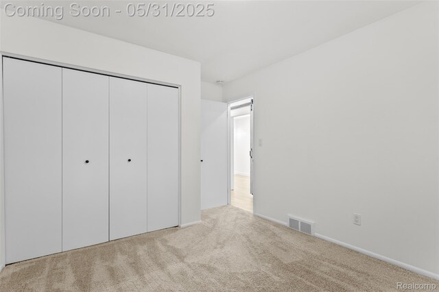 27677 Doreen St, Farmington Hills, MI 48336 - unfurnished bedroom with a closet and carpet