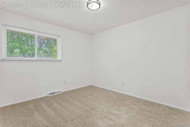 27677 Doreen St, Farmington Hills, MI 48336 - carpeted spare room featuring baseboards