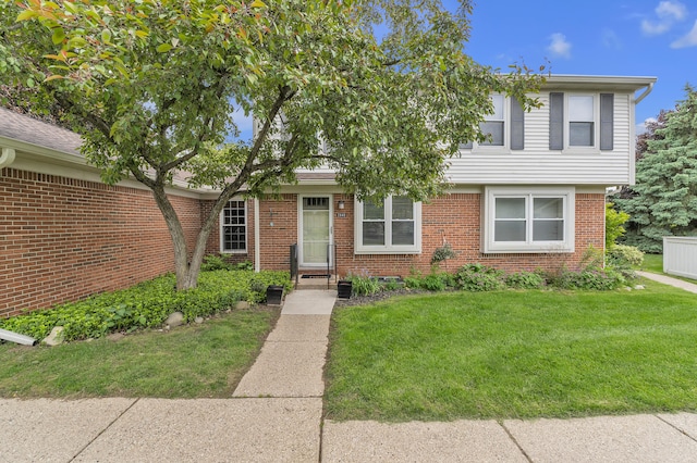 2840 Bombridge Ct, Ann Arbor, MI 48104 - view of front facade featuring a front yard and brick siding