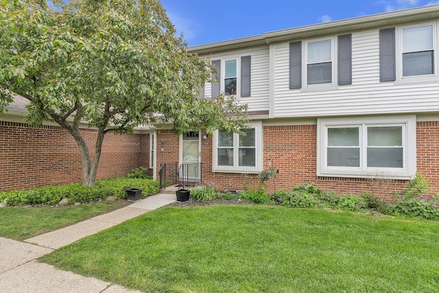 2840 Bombridge Ct, Ann Arbor, MI 48104 - view of front of property with a front yard and brick siding